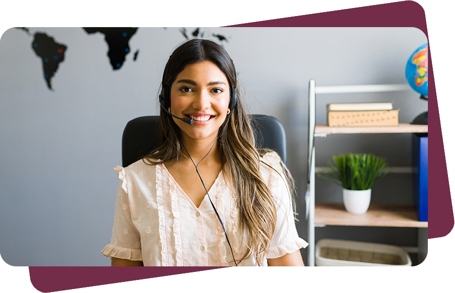 Lady smiling in phone headset.